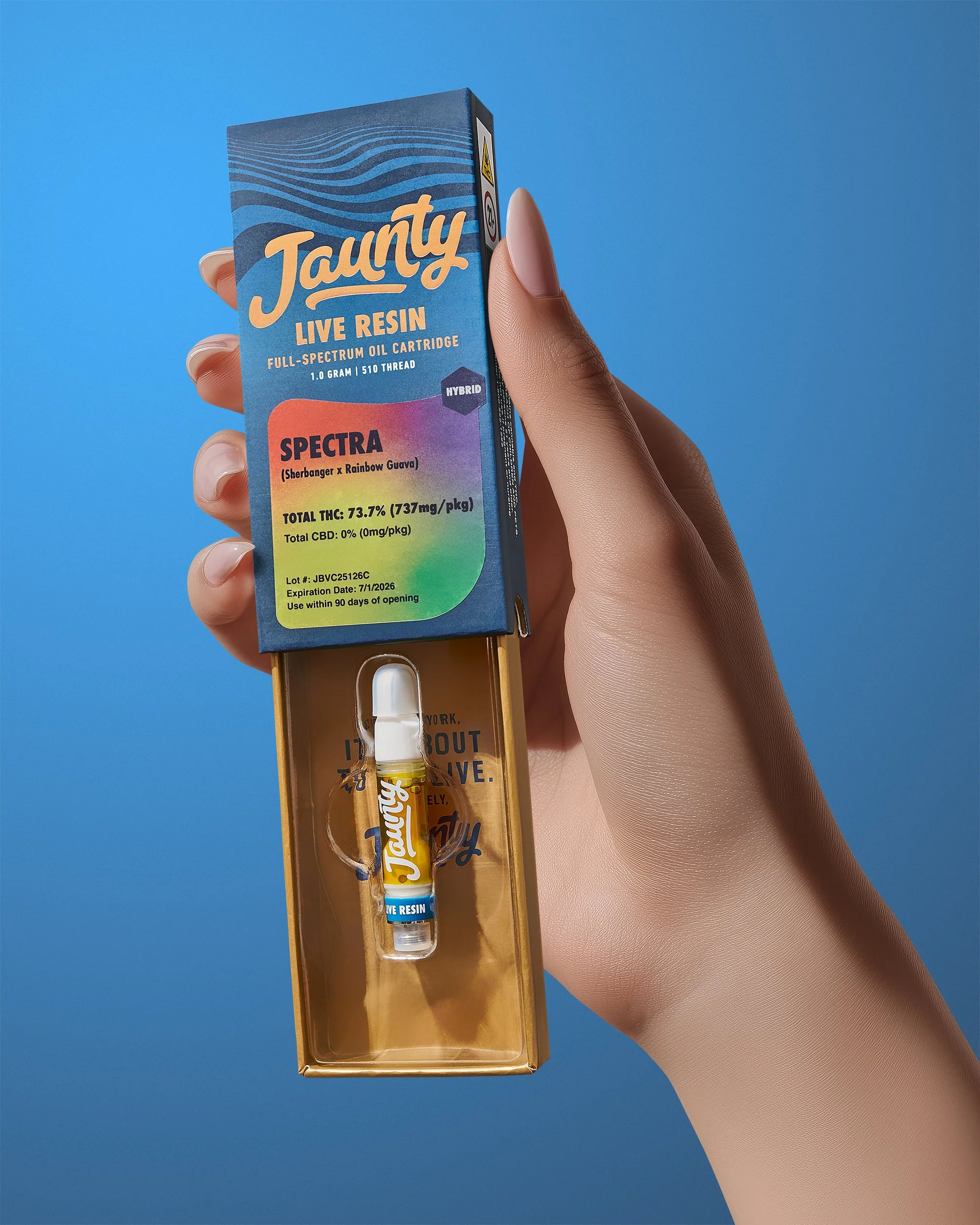 Jaunty - Spectra Live Resin cart, with hand holding open packaging, v2_ copy.jpg