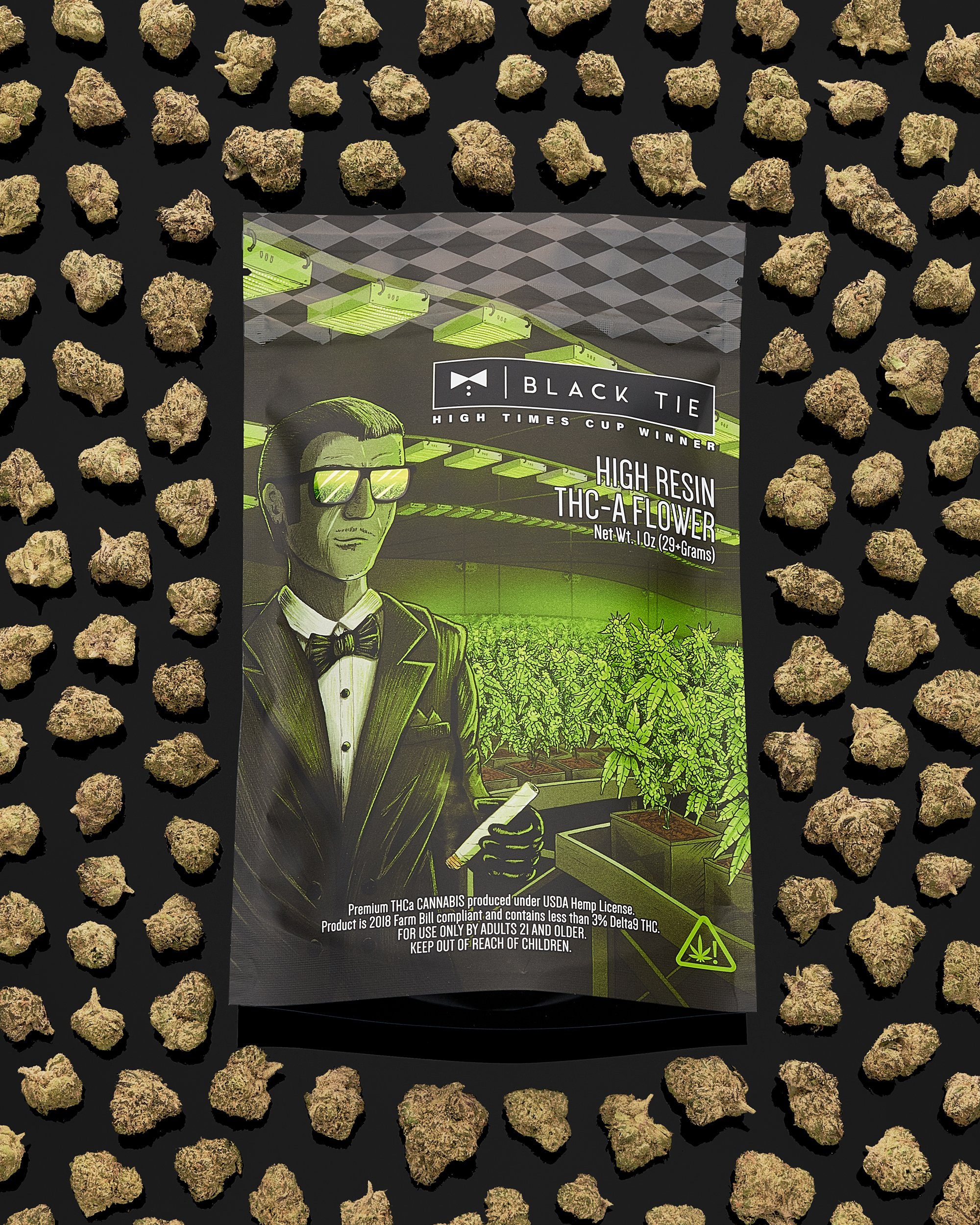 Black Tie - Critical Mass, front of bag with flower surrounding bag, black background, see swipe 3_.jpg