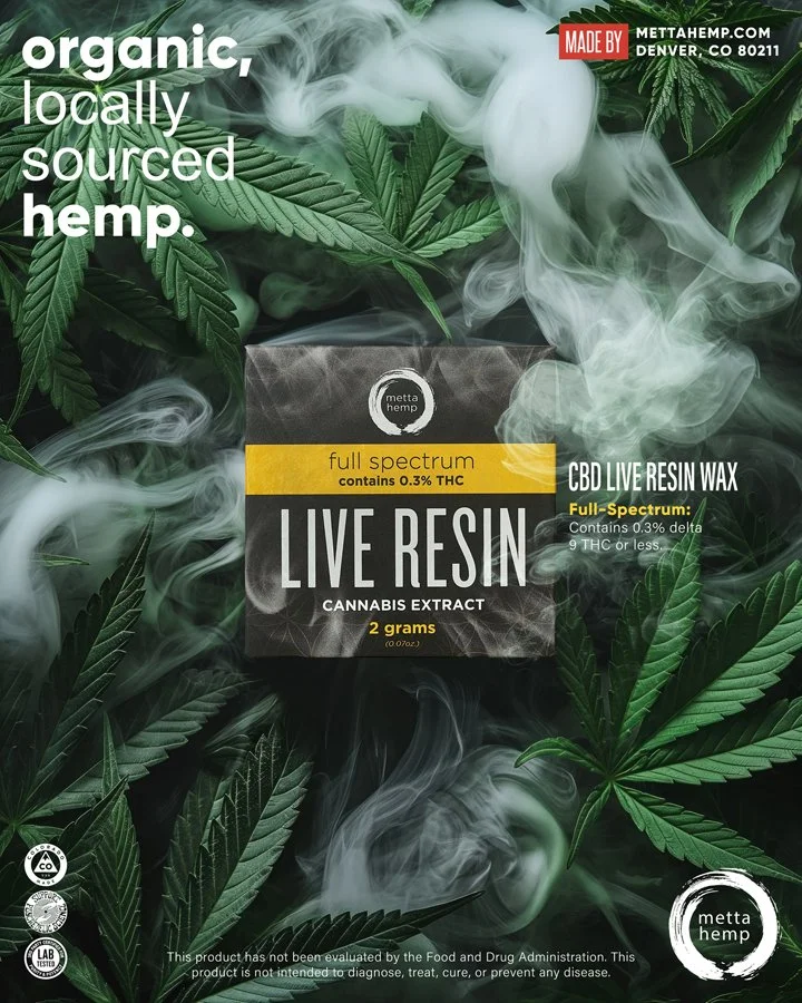 Packaging for CBD live resin wax with cannabis leaves and vapor clouds in the background. The label indicates it is organic, locally sourced hemp, full spectrum, contains 0.3% THC, and 2 grams of cannabis extract.