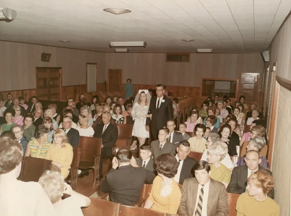 Wedding of Margaret Curbo to Bert Brunett in 1968. This was one of the last ceremonies performed in the old ‘Towash Building’.