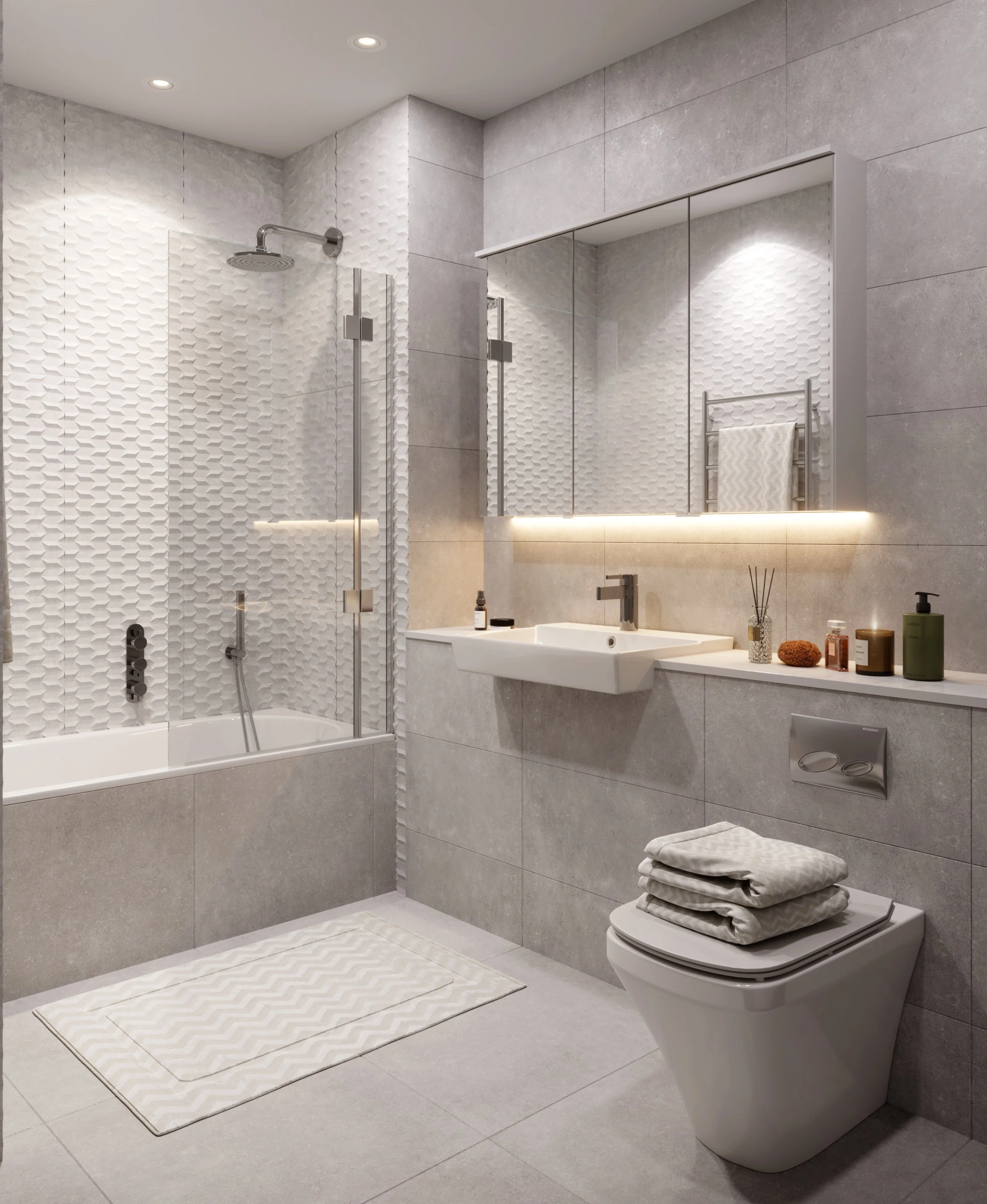 Contemporary show home bathroom with textured wall tiles, walk-in shower and integrated vanity designed for residential development.