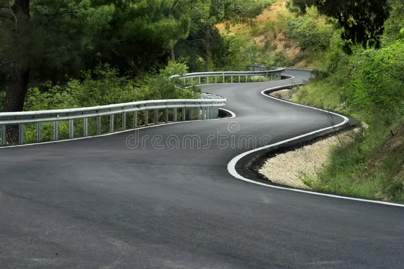 s-shaped-road-forest-new-106556643.webp