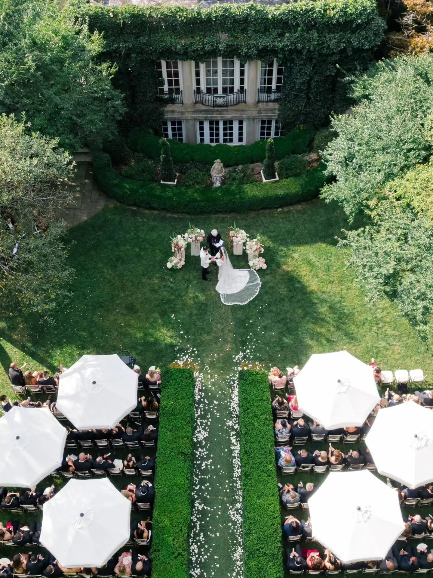 On a warm summer day this past August we celebrated Rachel & Pete at Lord Thompson Manor with a luxury, European villa vibe and artful touches everywhere. We layered antique Hydrangeas, Dahlias and Roses with Calla Lilies, Orchids, and Hanging Am