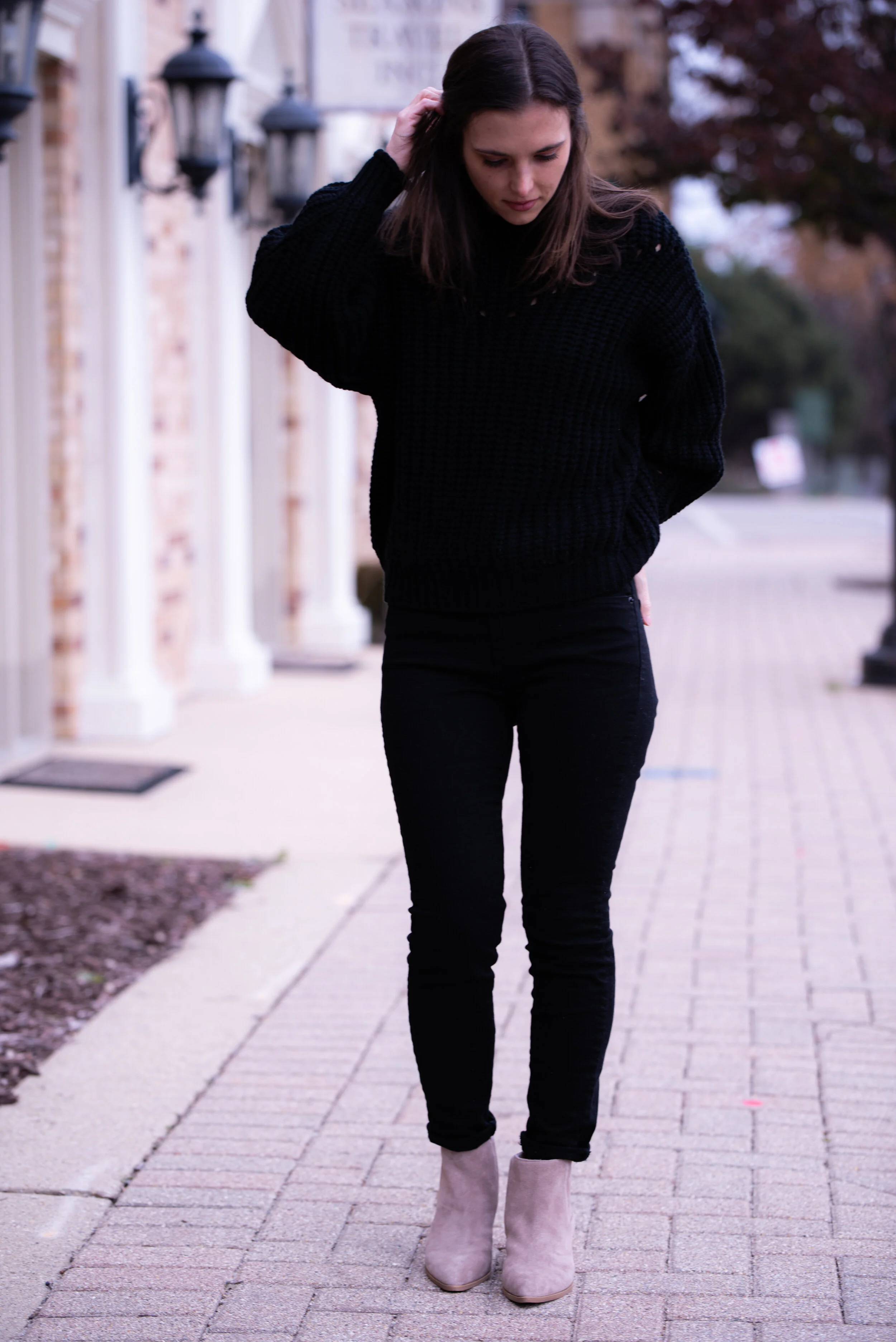 black sweater with black jeans
