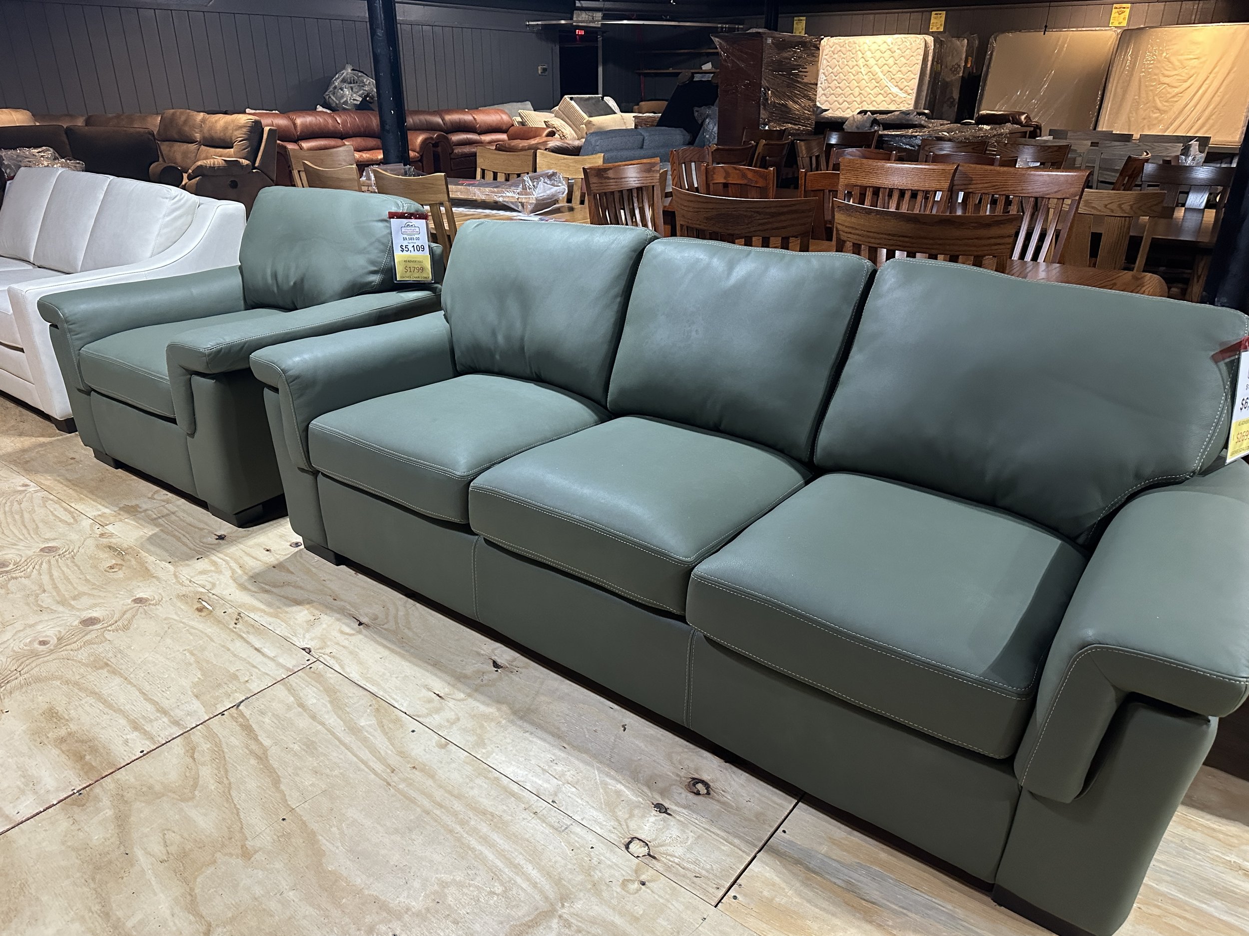 Green leather sofa and chair