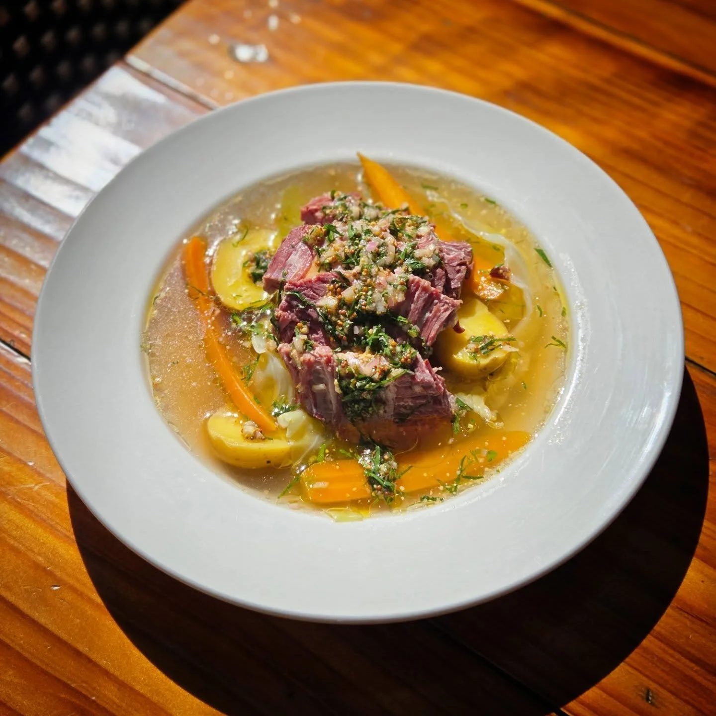 Our thick-cut corned beef plate is giving main character energy this St. Padd&rsquo;s Day 🍀 Slow cooked and juicy, piled high with cabbage, sweet Nantes carrots, and buttery fingerling potatoes, finished with a punchy whole grain mustard salsa verde