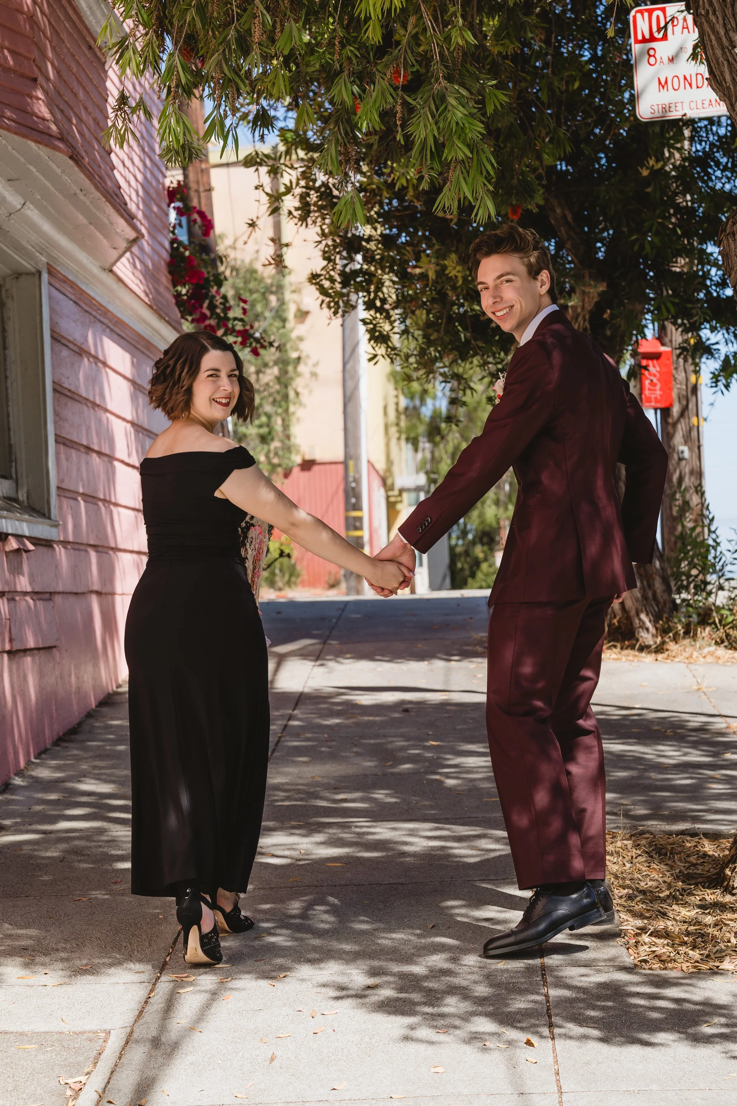 Couple walking hand in hand through their Potrero Hill neighborhood