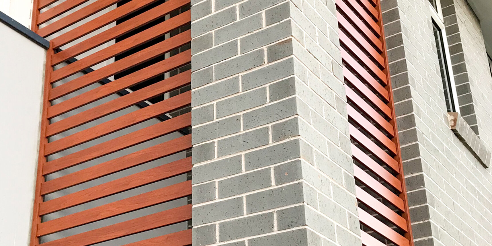 knotwood aluminium facade screen install Green fox Metals
