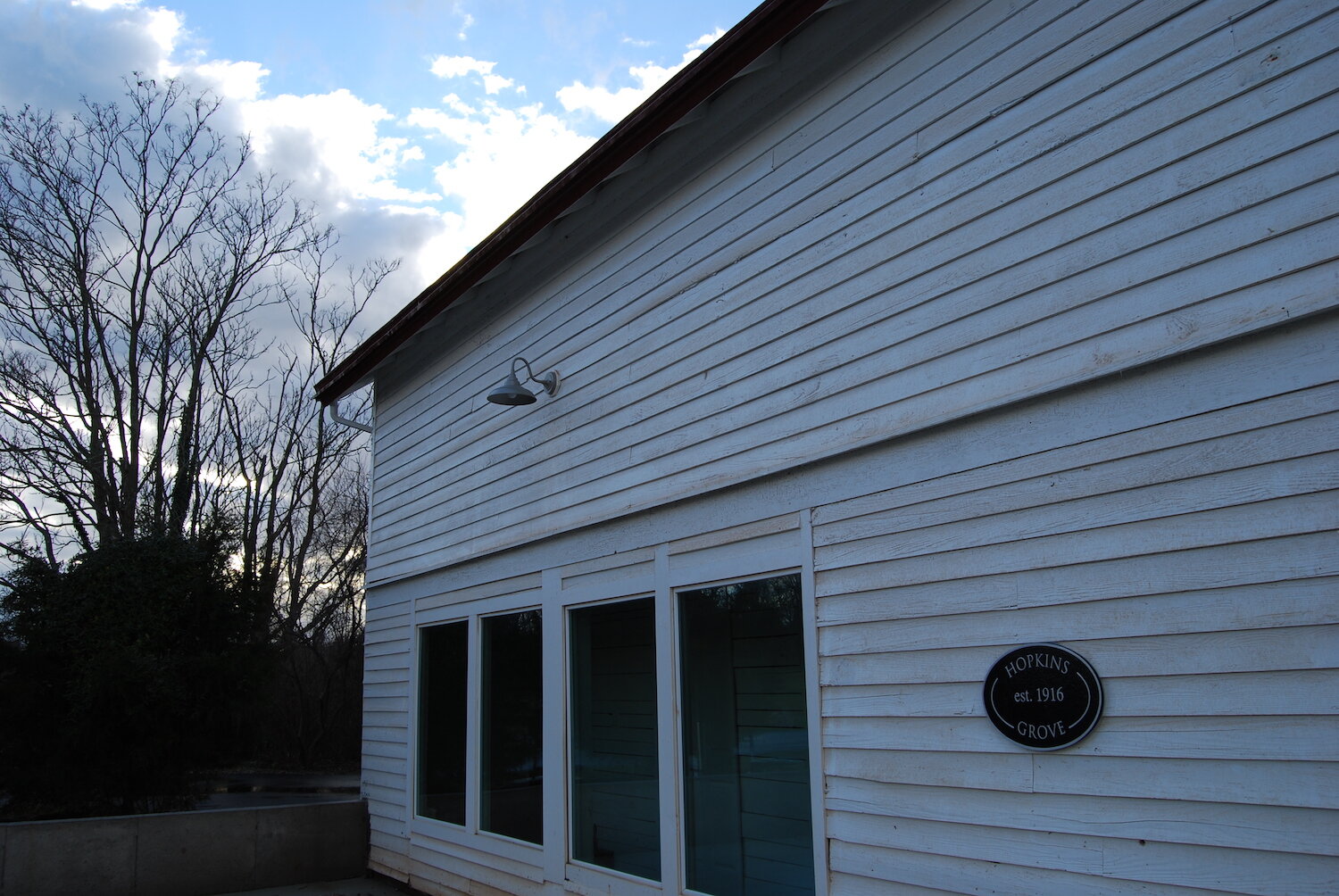 Exterior with wall and sign.JPG