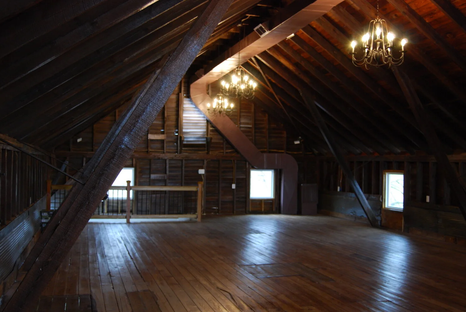 Upstairs with chandeliers 2.JPG