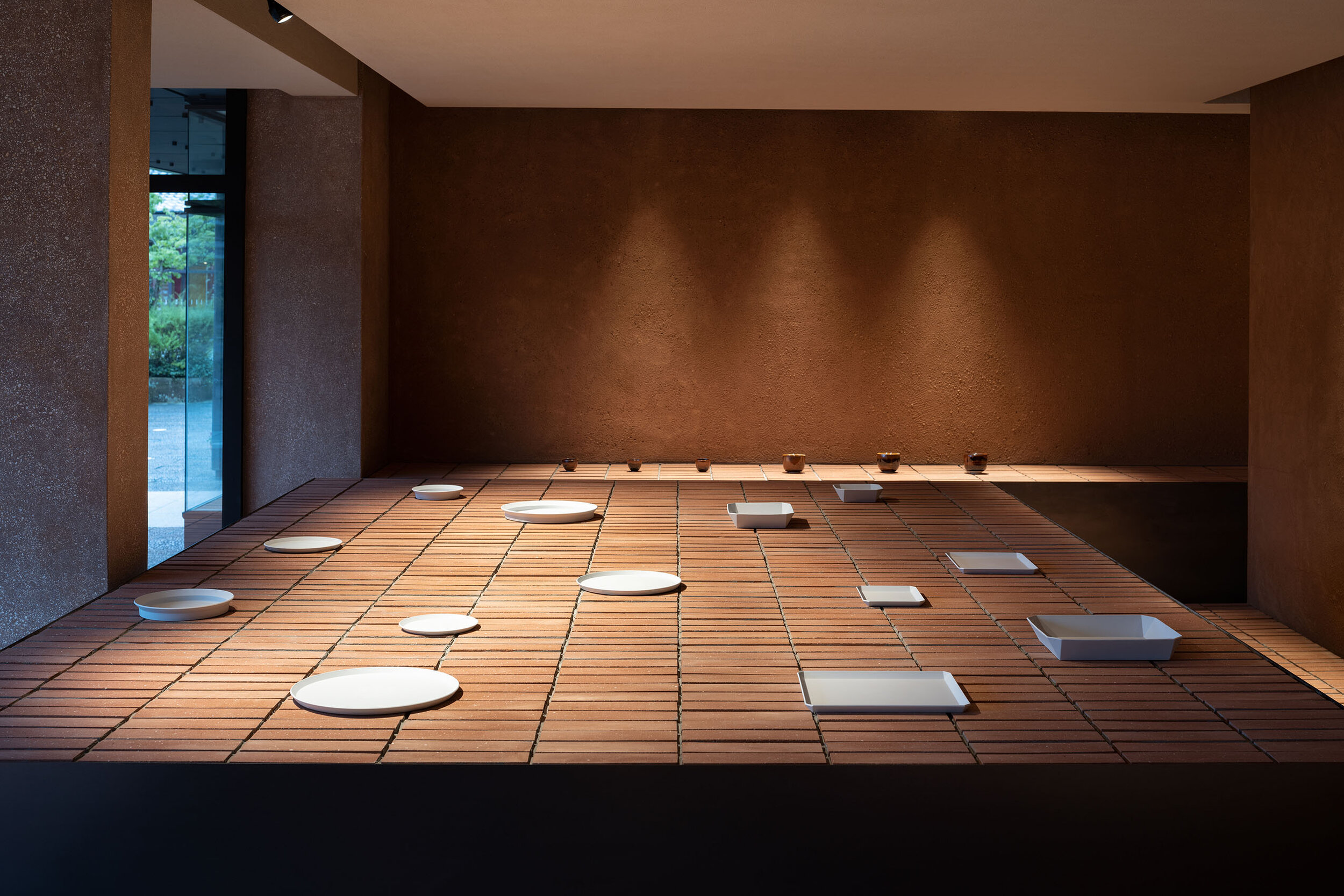  display table of 1616/arita japan showroom designed by Teruhiro Yanagihara Studio 