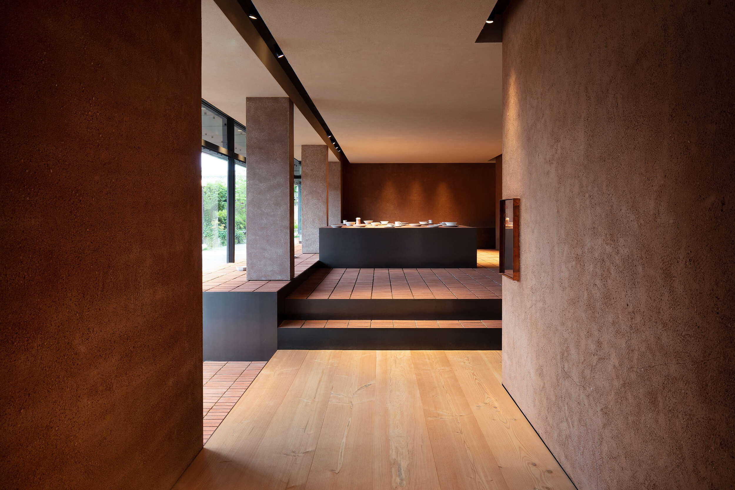  Teruhiro Yanagihara Studio has designed warm interior for 1616/arita japan showroom in Arita, Japan. 
