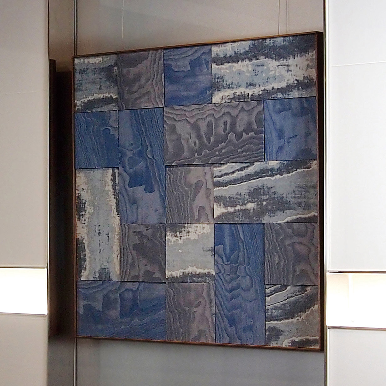  A custom-made art panel made with upcycled material NUNOUS in the office entrance. 