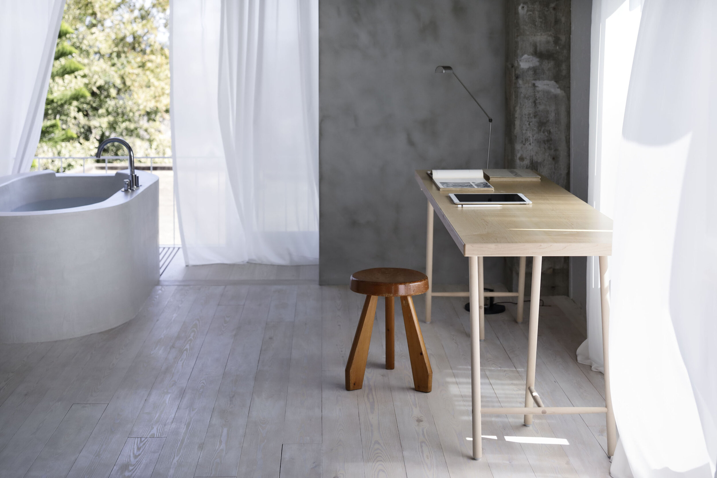  The vitage wooden stool was designed by Charlotte Perriand. 