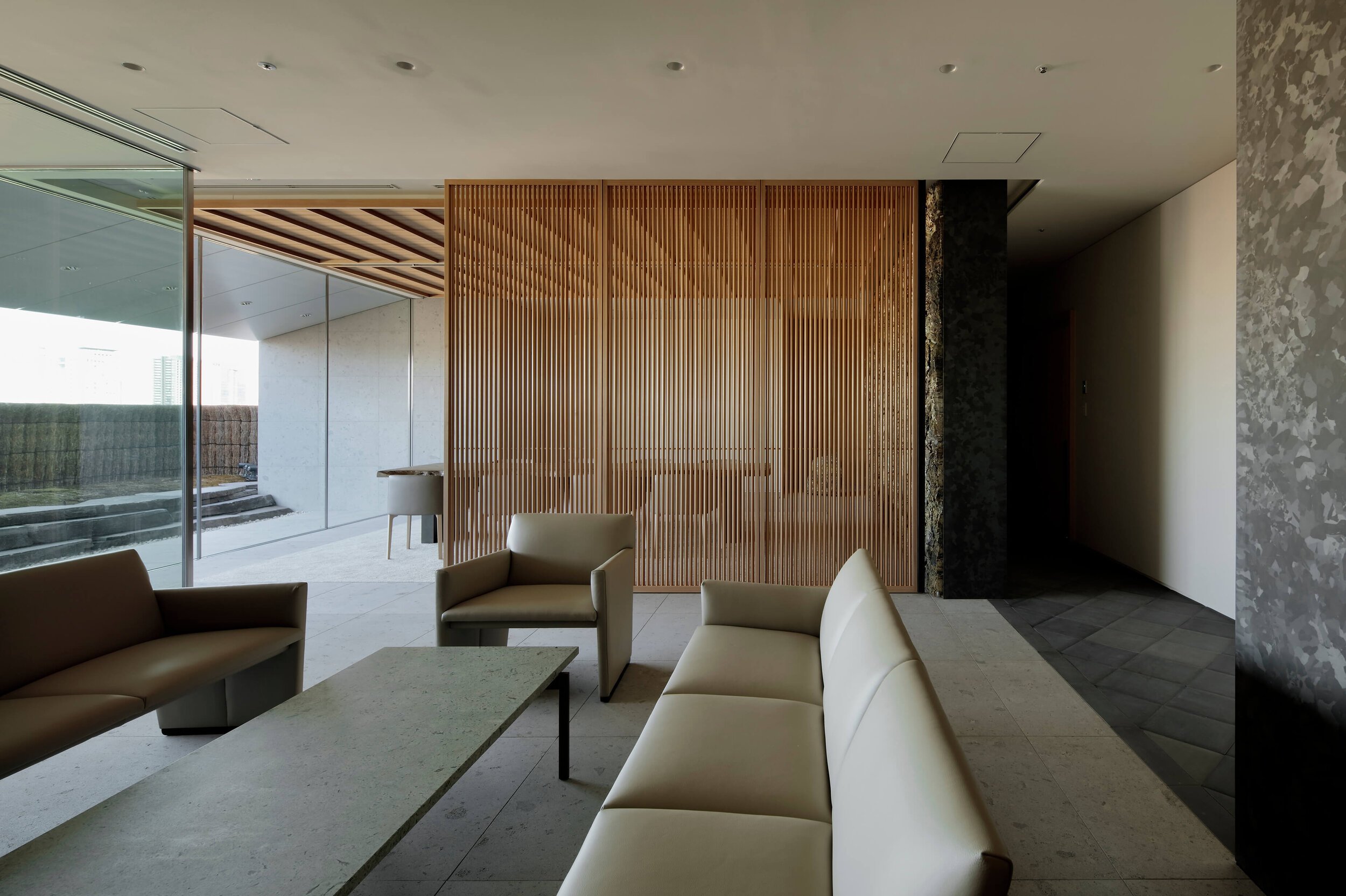 lounge with wood partition of ntv project by tomoyuki sakakida architect in tokyo japan