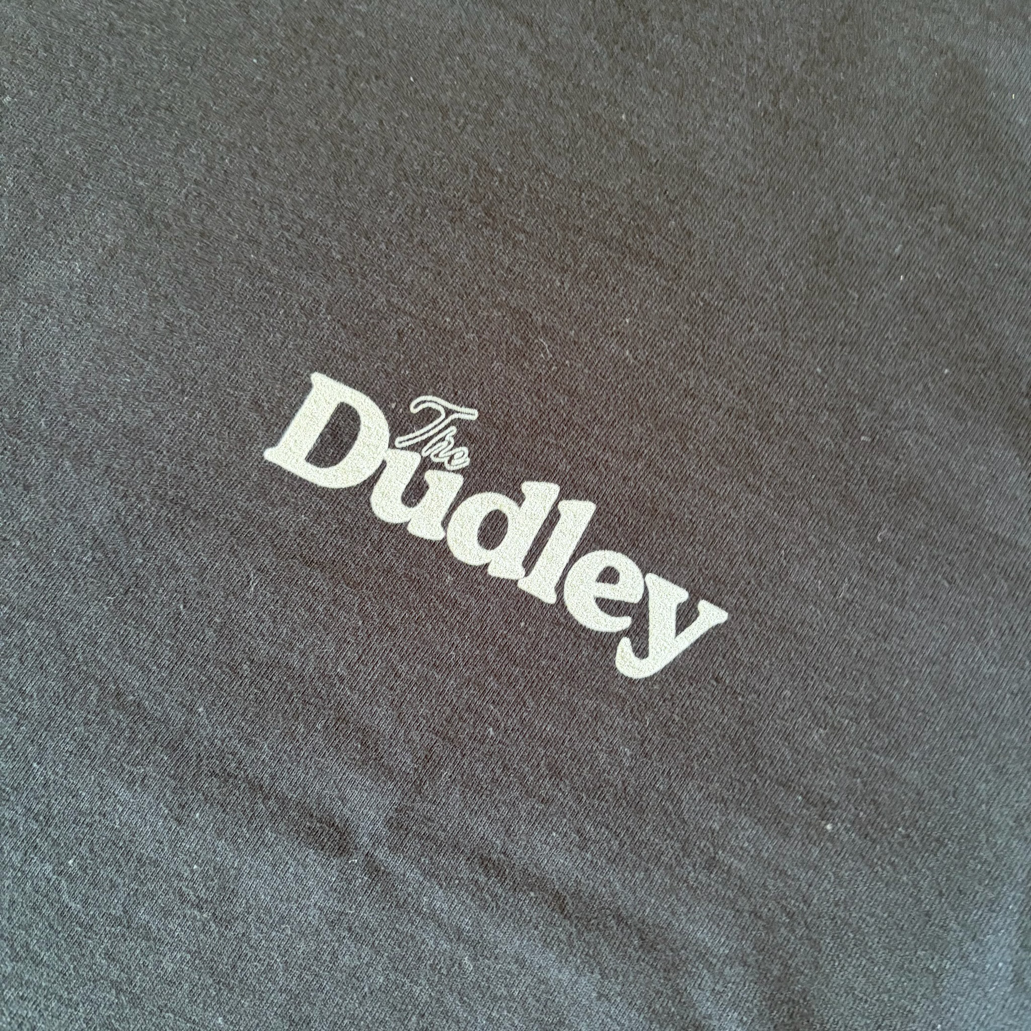 black tee front close up.png
