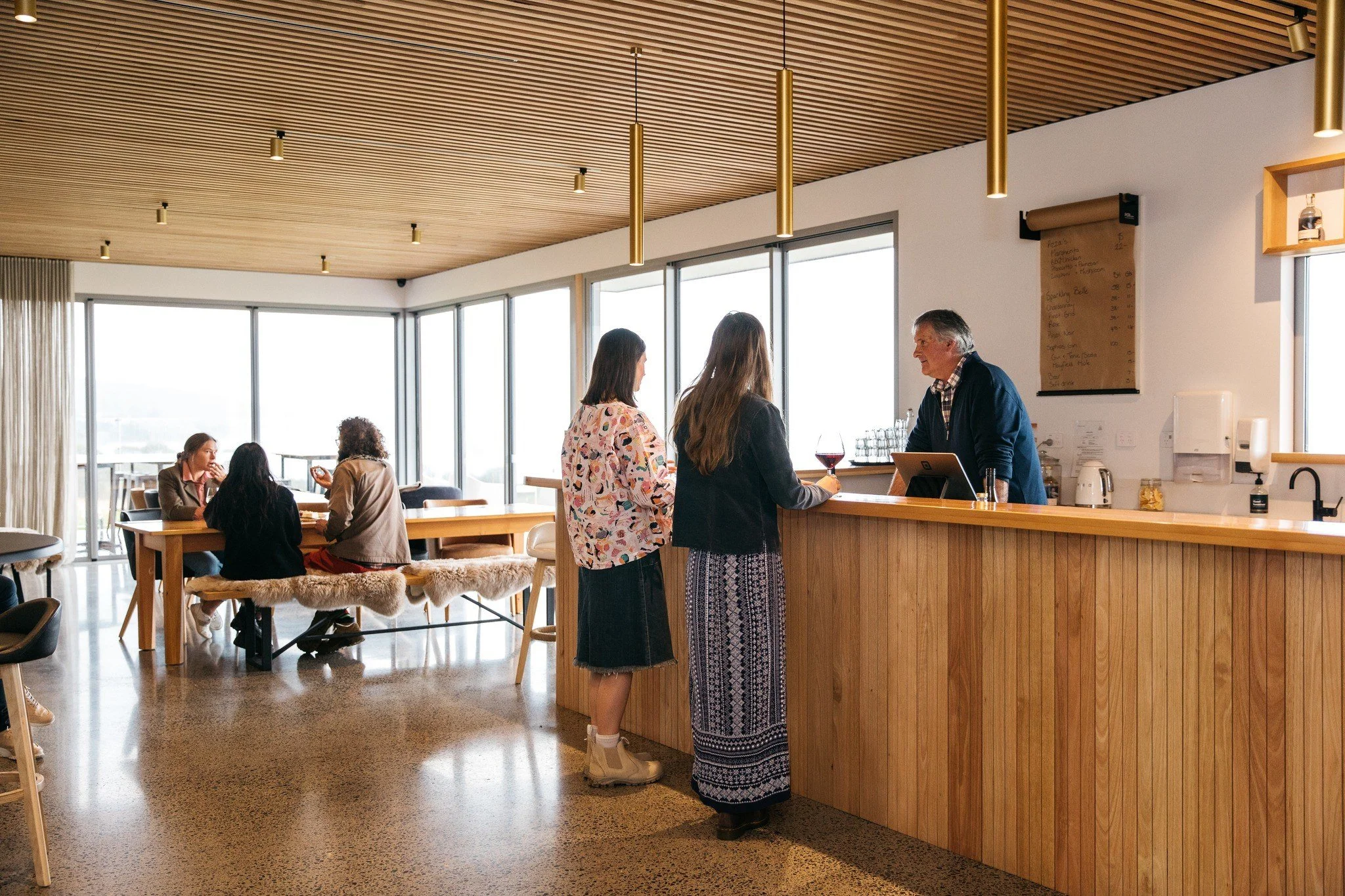 Mayfield Estate Tasting Bar, an airy vaulted cellar-door tasting room on Tasmania’s east coast by Saxon Hall Architecture