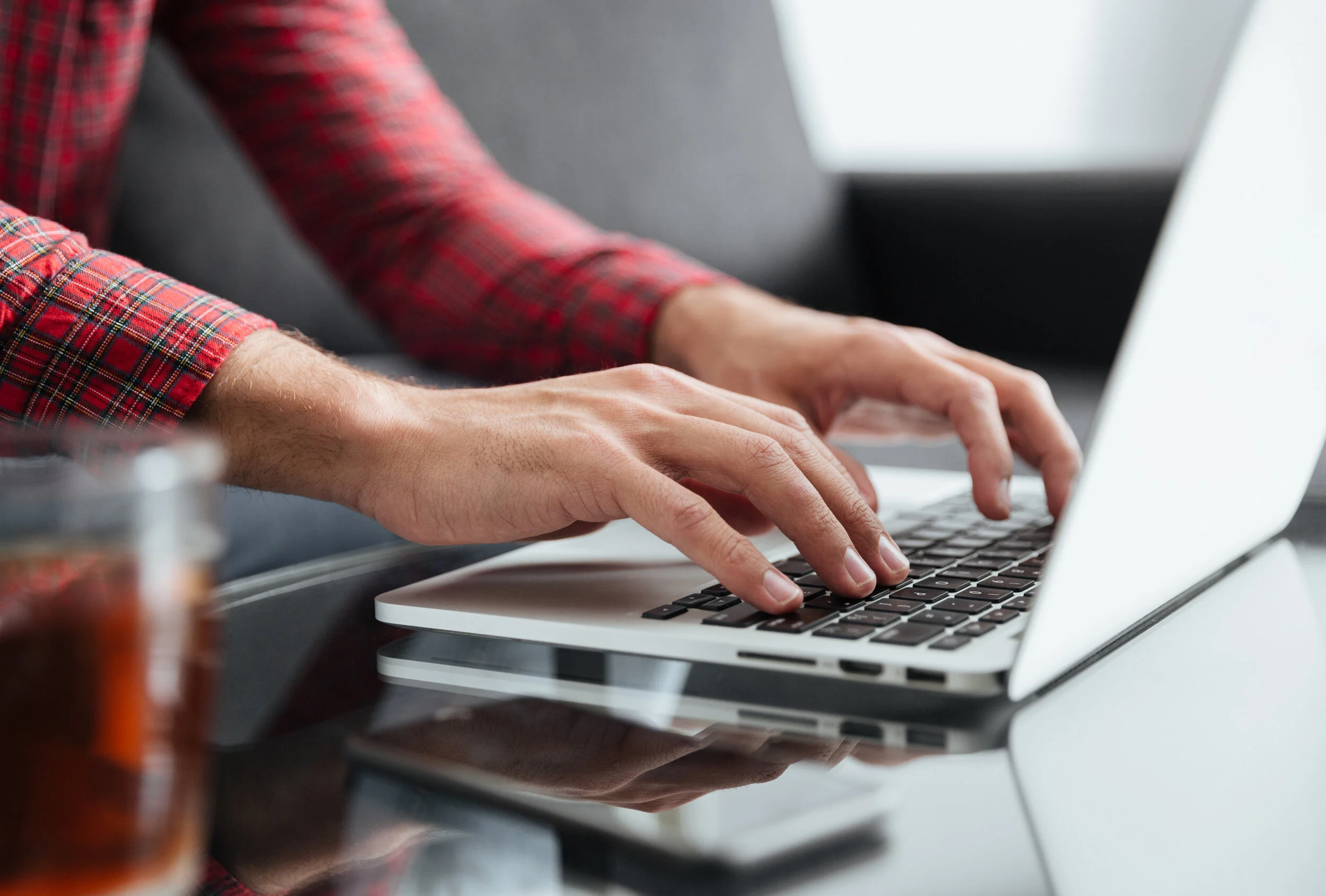 close-up-of-man-typing-on-keyboard-P77MPW7.jpg