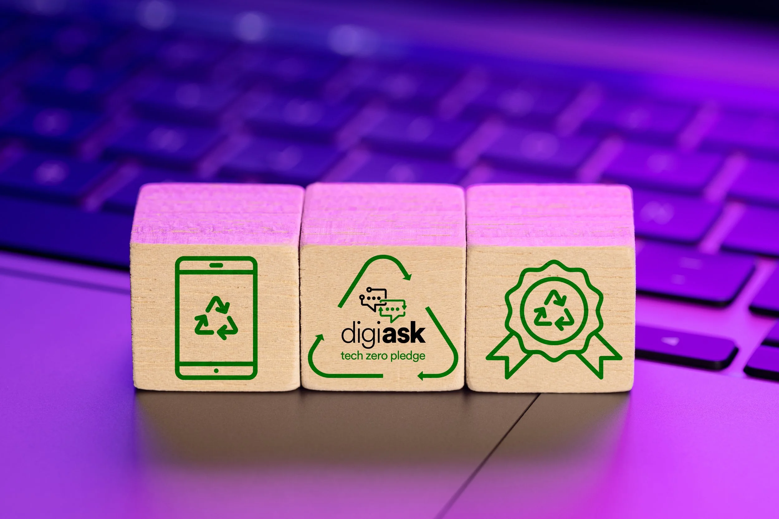 Digiask-icons-on-wooden-blocks-on-laptop-with-c-2022-06-08-15-12-57-utc.jpg