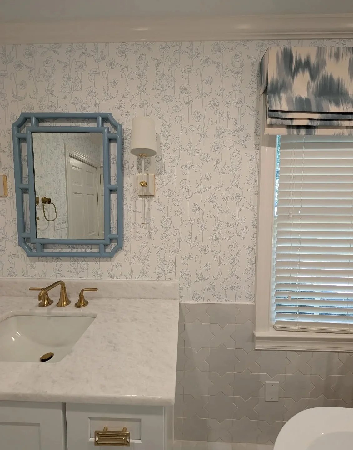 The prettiest blue &amp; white primary bathroom. This was one of our big projects we worked on this past year, and I can't wait to share more pictures of the beautiful space 💙
.
.
.
#primarybathroom #blueandwhitebathrooms #winstonsaleminteriordesign