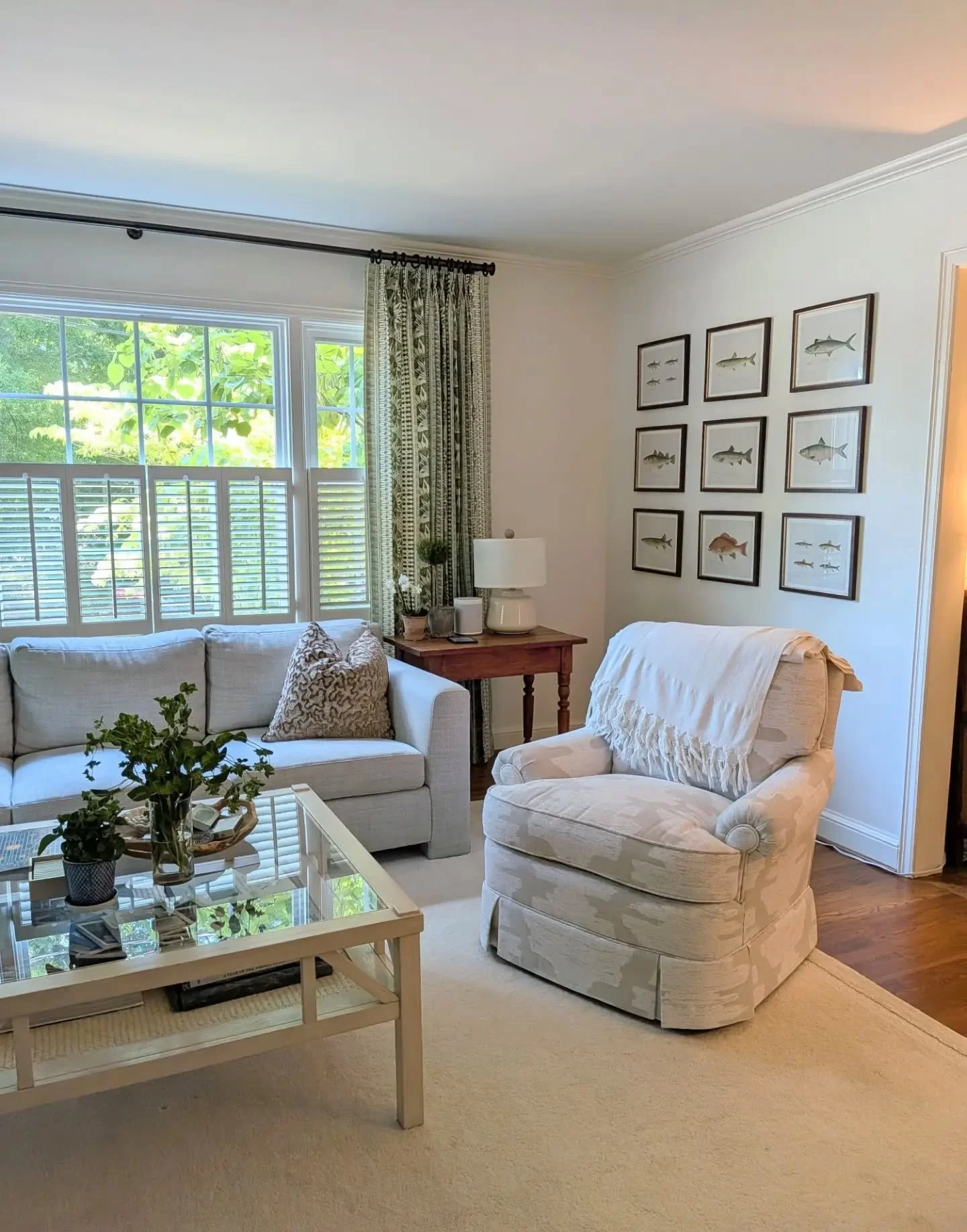 Some pretty green and neutral updates for this home 💚
.
Pretty curtains that soften the room and add some subtle color, fresh upholstery on the chairs, pillows, fireplace poufs and a coffee table with storage. 
.
.
.
#lovewhereyoulive #winstonsalemi