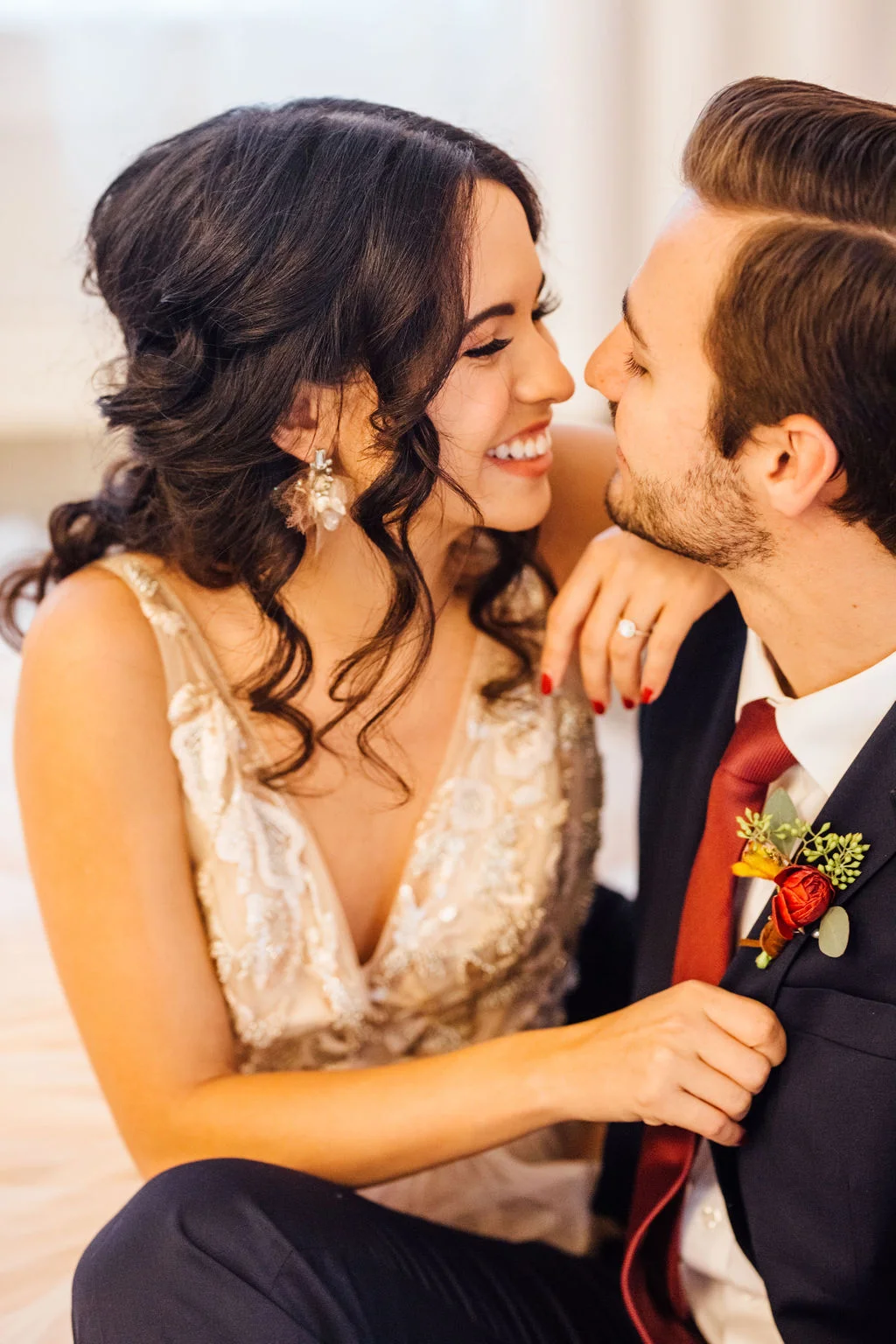 Wedding hair and makeup romanctic losse updo with soft curls and peachy makeup