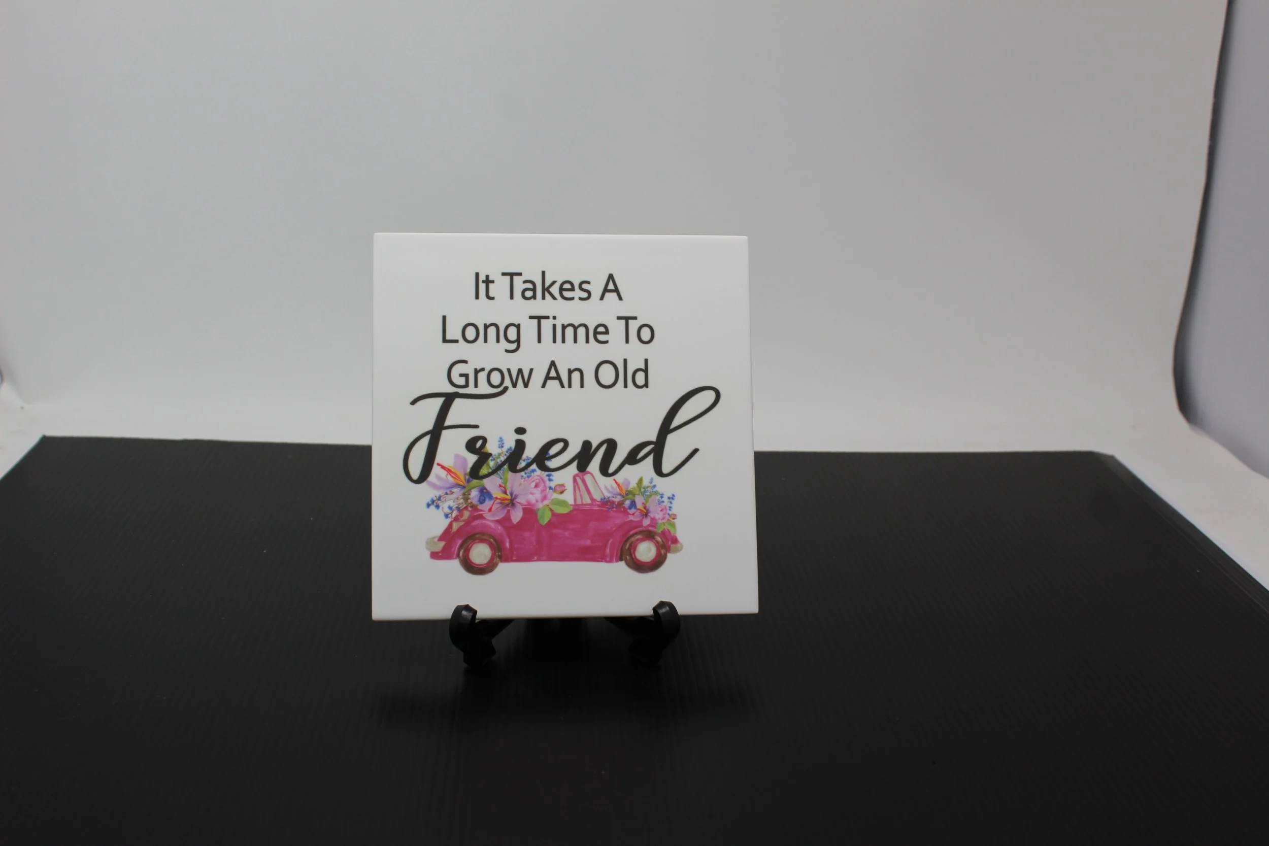 "It takes a long time to grow an old friend" 6 x 6 Corian Tile