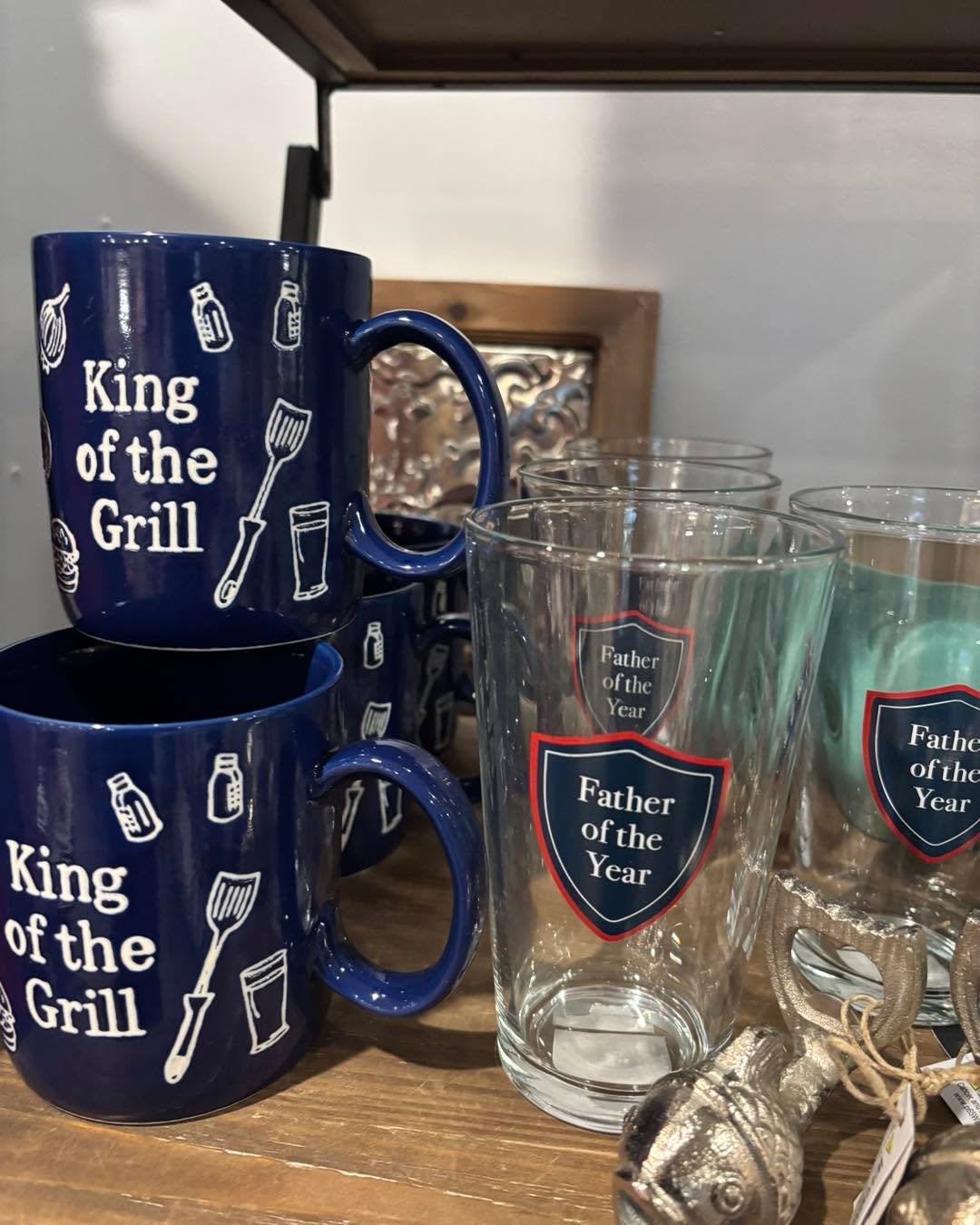New to the men&rsquo;s section! &ldquo;Father of the Year&rdquo; glasses, mugs, grilling mits and so much more to see!  Stop in and meander through the shop!  Blossoming Creations, downtown Emmetsburg!