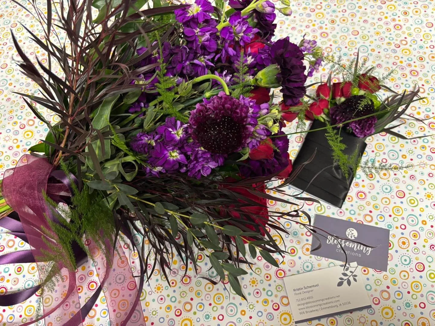 Love this bridal bouquet and the rich colors.  The added touch of the ribbons are so pretty.