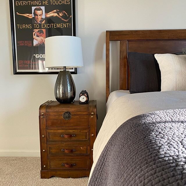 A bedroom for any young man&mdash; framed movie posters, a vintage alarm clock, and bedding from Bed, Bath, and Beyond and Pottery Barn. #breathingroominteriors #basehousing #potterybarn #potterybarnbedding #potterybarnstyle #bedbathandbeyond #middle