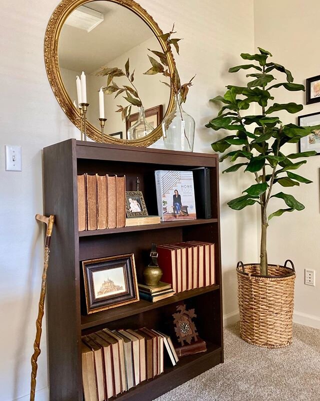 Need help styling shelves? I&rsquo;m your girl! I love taking things you have tucked away in closets and cabinets and finding the perfect home for your hidden treasures! #breathingroominteriors#bookshelfdecor #bookshelves #hiddentreasures #officedeco