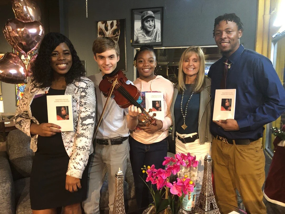 Corbin volunteers and performs at &quot;Trapped in the Homeless Hustle&quot; book event to raise funds and awareness for homeless families.⁠ Pictured with author Erica Moseley, Erica's family and guests.⁠
⁠
#music4happiness #volunteer #music #givingb