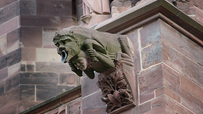  Exterior view and gargoyle of the Freiburg Minster, Freiburg im Breisgau in Germany. Men and mythical creature as a gargoyle by Asurnipal. This file is licensed under the  Creative Commons   Attribution-Share Alike 4.0 International  license.    