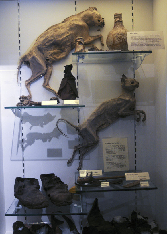  RAF MILDENHALL, England – Mummified cats, shoes and witch bottles are on display at Moyse’s Hall in Bury St. Edmunds. In the 16th and 17th Centuries, many believed witches drew their powers from the devil through small animals, or familiars, which w