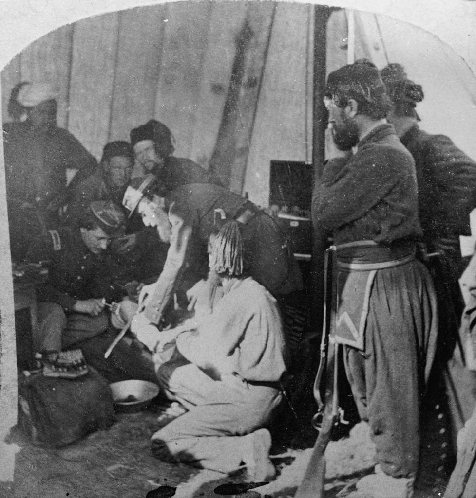 Army doctors performing an amputation in a make-shift hospital during the U.S. Civil War (1861-65), c. 1863. (Photo by Hulton Archive/Getty Images)