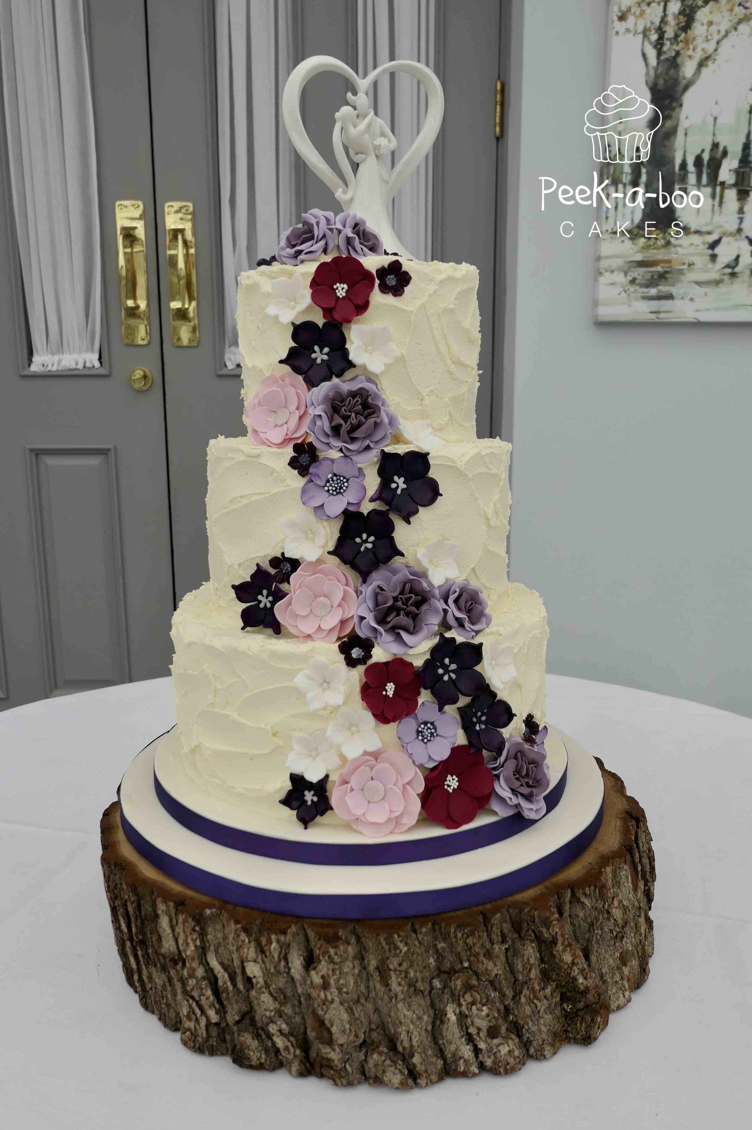 A47 Elegant Buttercream Wedding Cake With Black And White Flowers