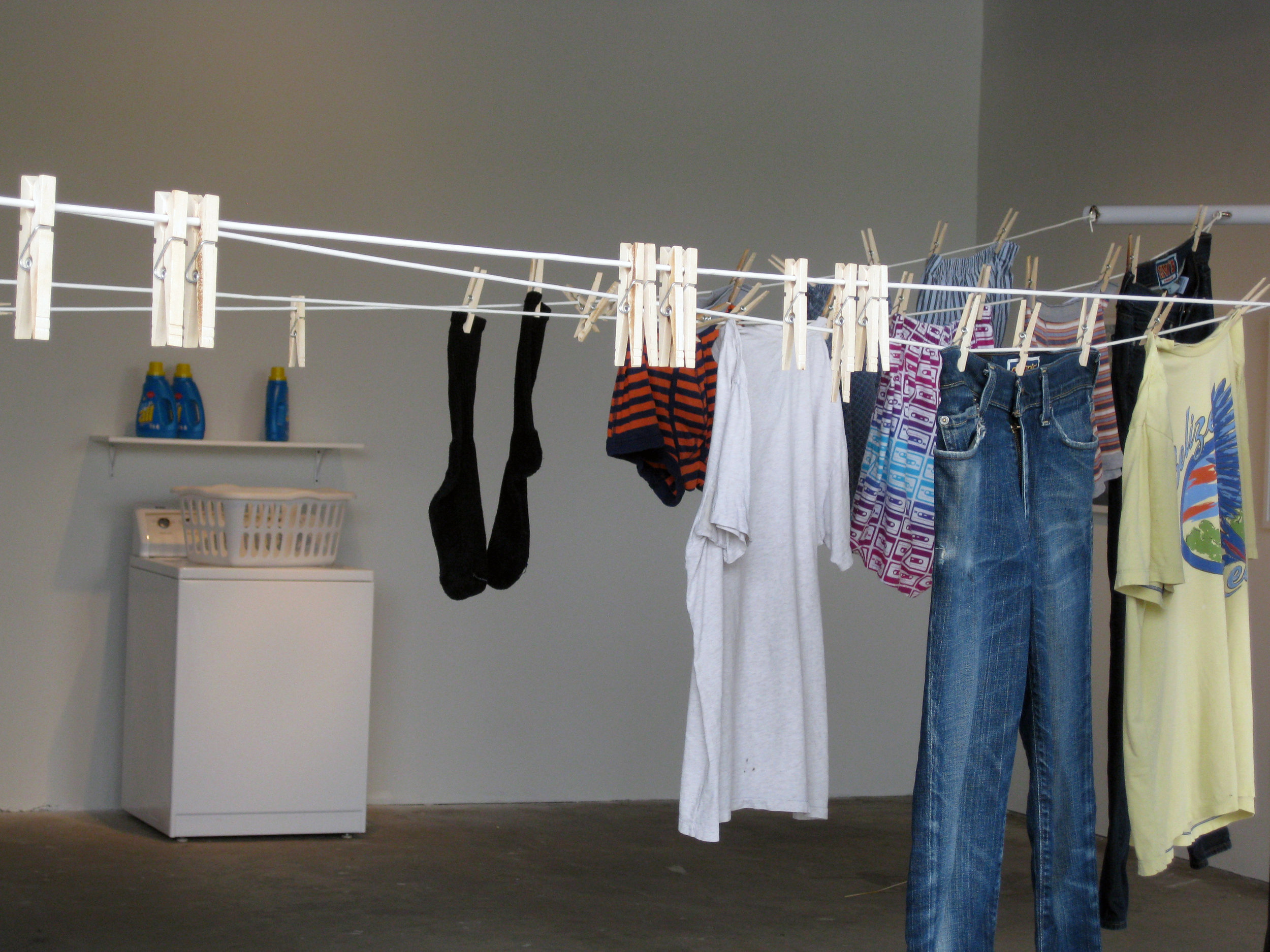 Mother, 2010, interactive installation with washing machine and clothes line