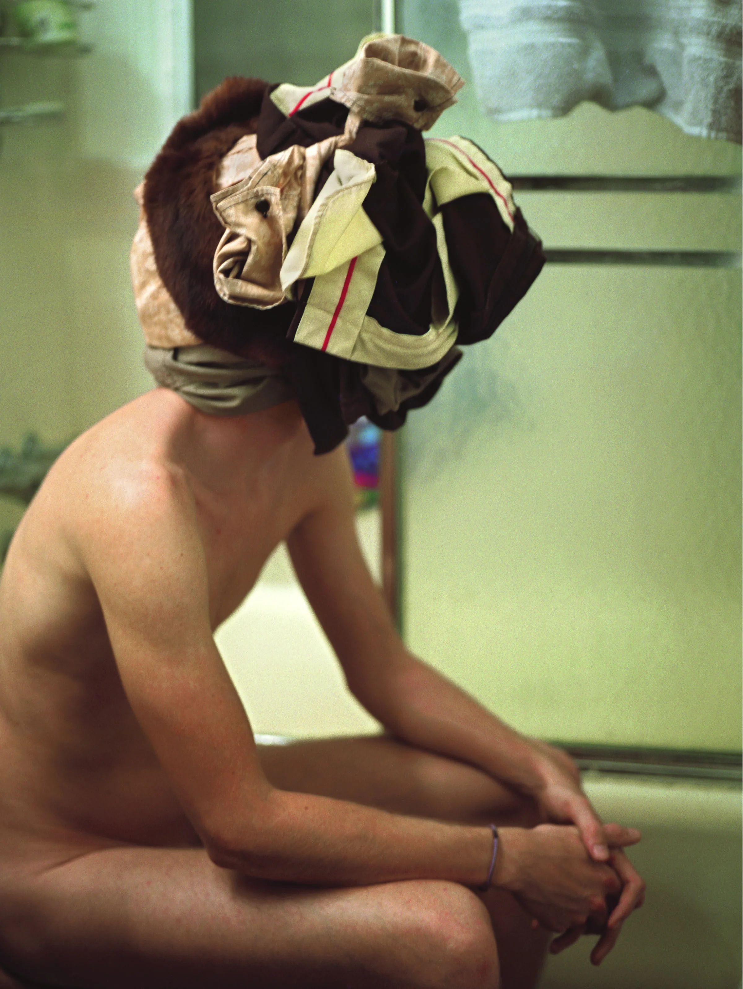 Untitled (Clothes on Head), 2007, c-print, 25” x 18”