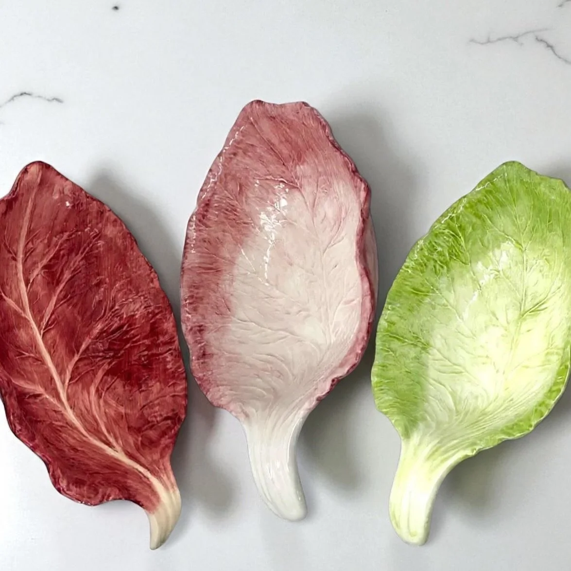 Radicchio Serving Bowls are here! Available in 3 colors.

#serveware #tabletopdecor #leafbowl #radicchio #majolica #modernmajolica #modernclassics #handpainted