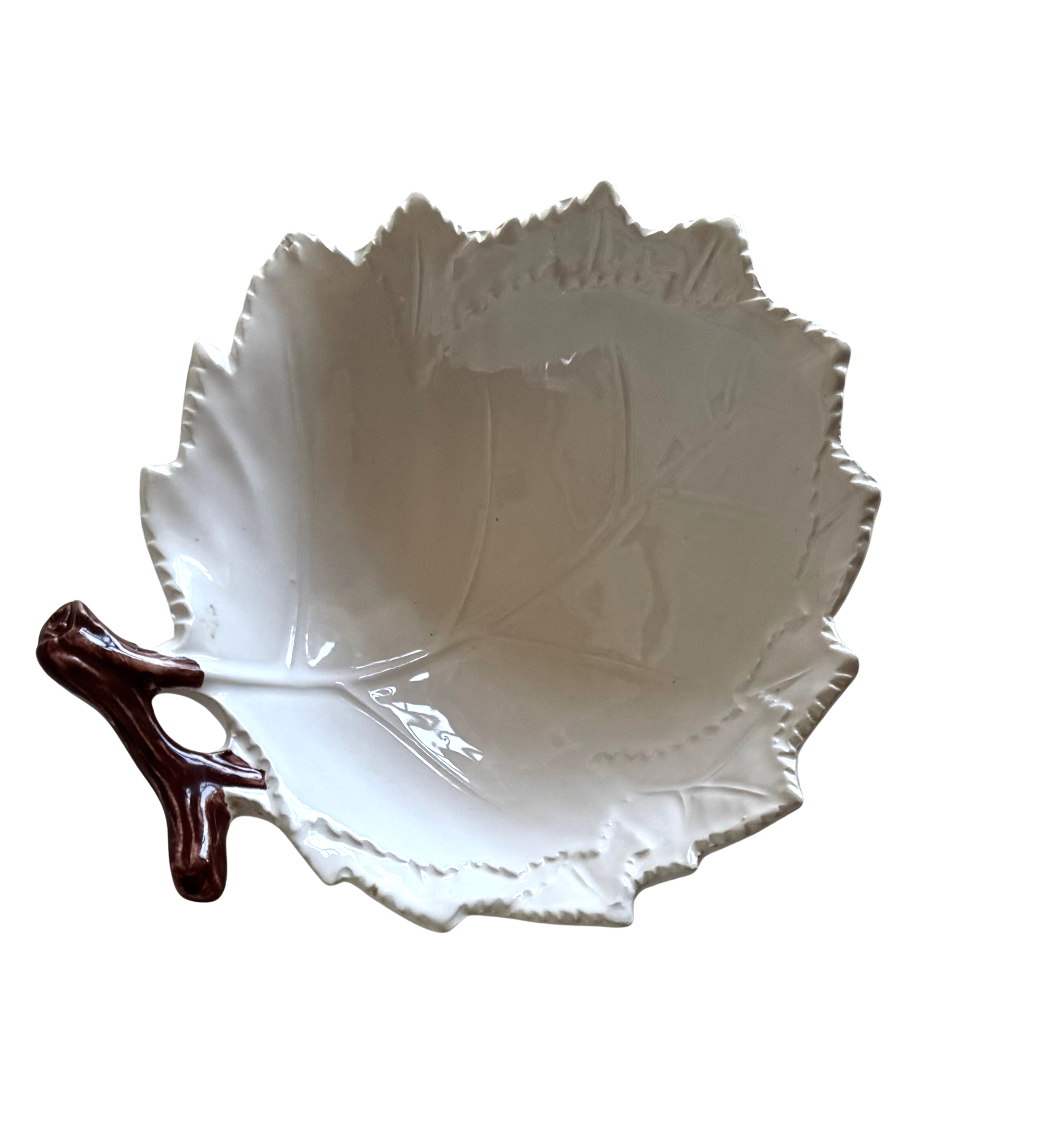 Small hand-painted white ceramic leaf bowl with natural branch handle, from The Mane Lion.