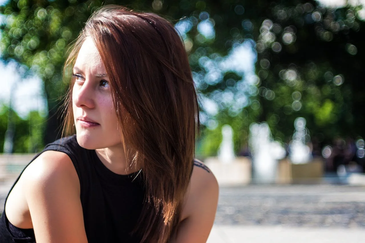 woman-wearing-black-crew-neck-tank-top