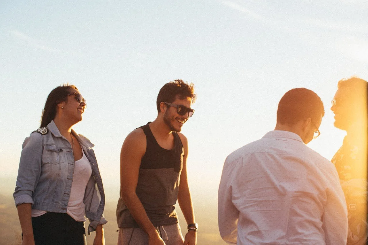 man-wearing-black-tank-top-standing-beside-woman-wearing-blue-denim-jacket