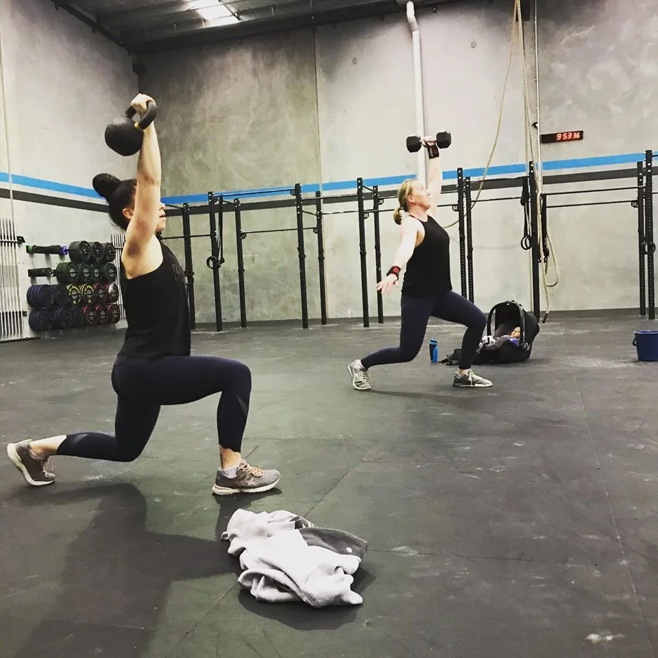 Picture of two people doing CrossFit