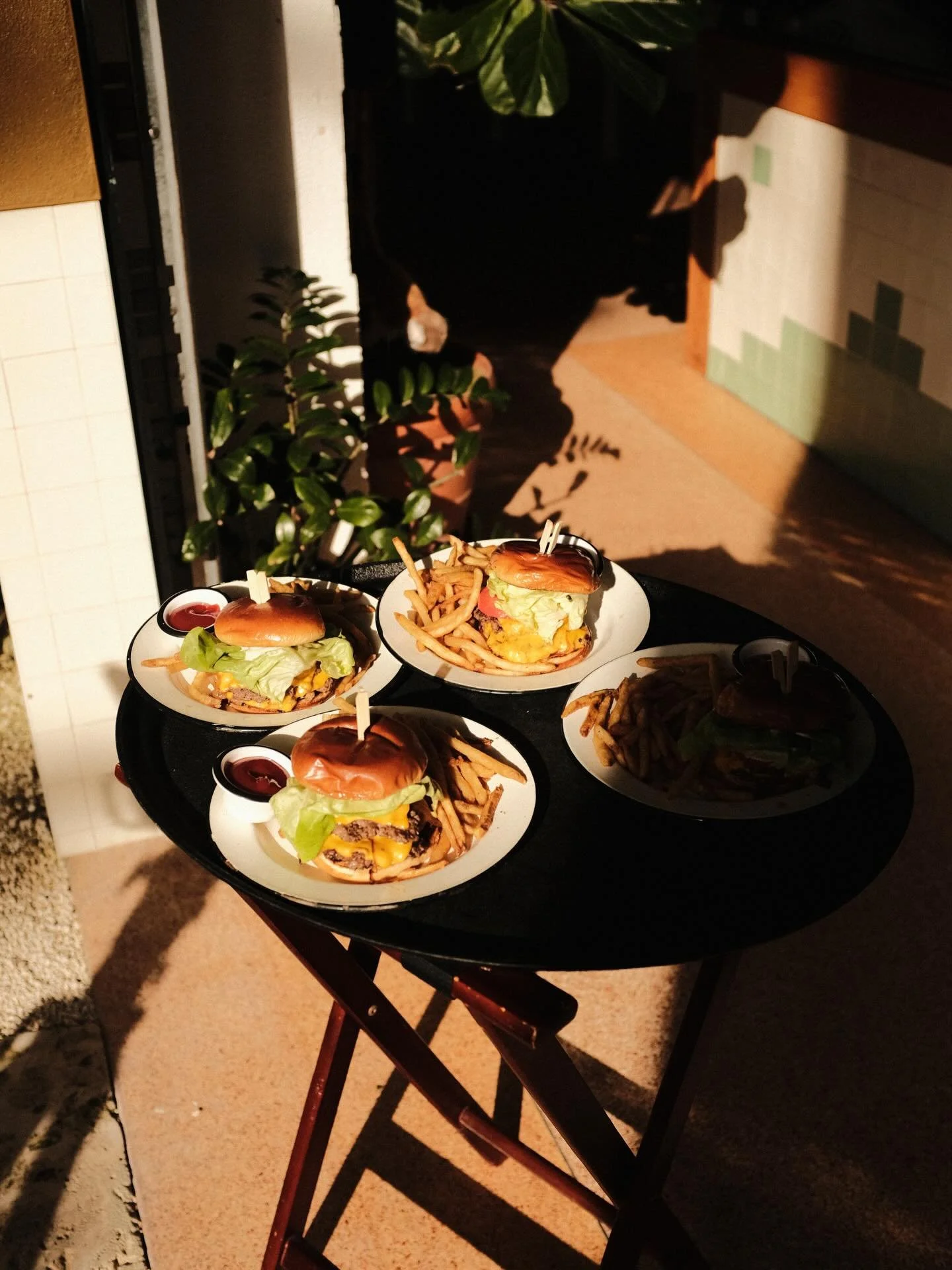 Gulf Coast evenings at Whitney&rsquo;s just hit different. 🏄&zwj;♀️☀️🏖️🌊🌺