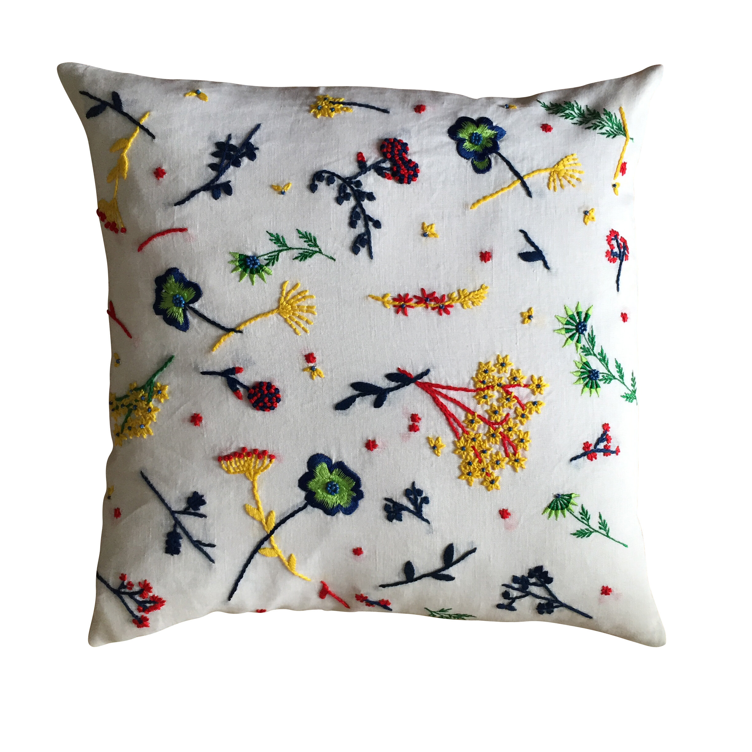Ruth Eaton, Meadow cushion, White with blue, green, red, yellow embroidery