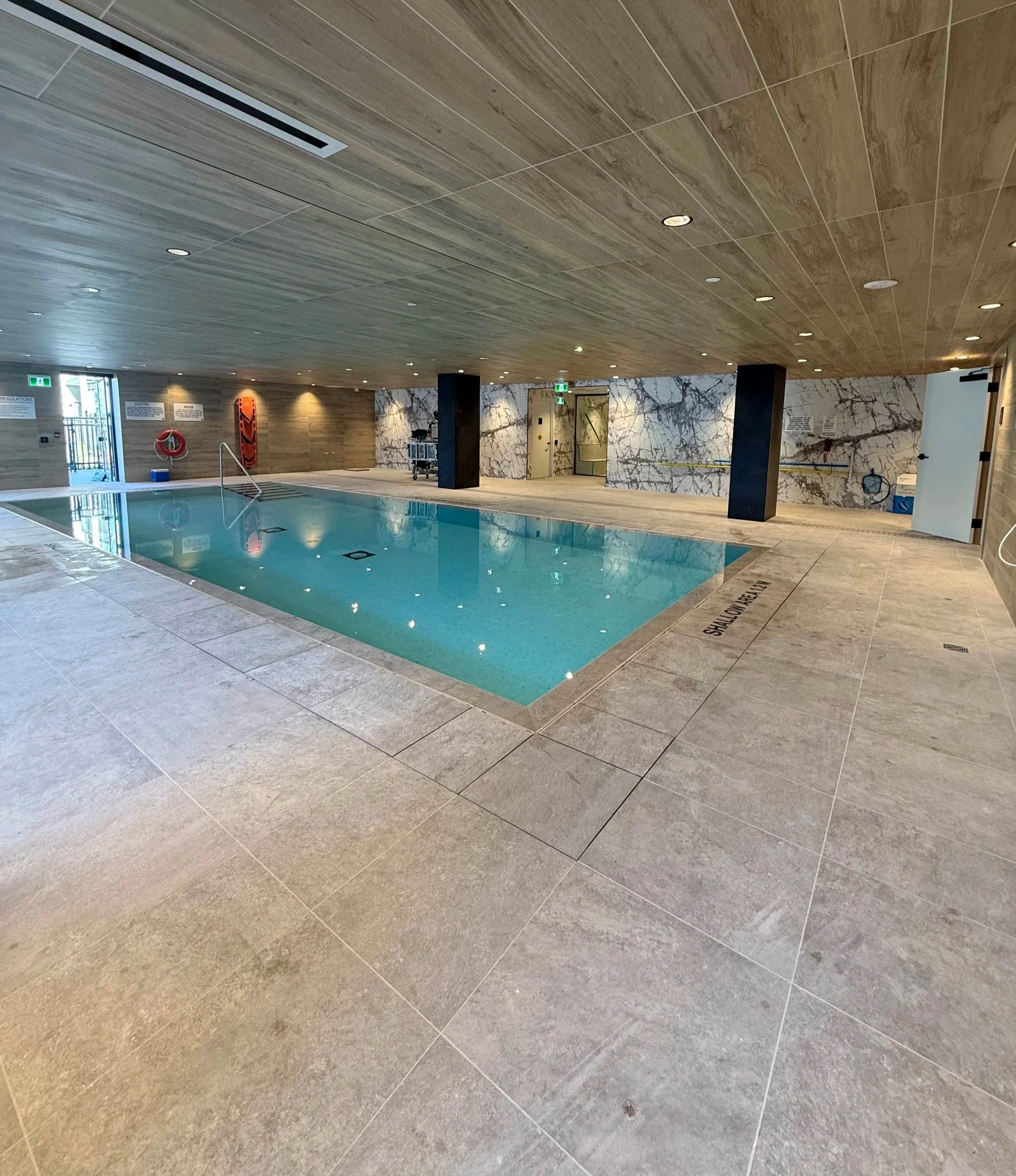 Condo pool tile installation