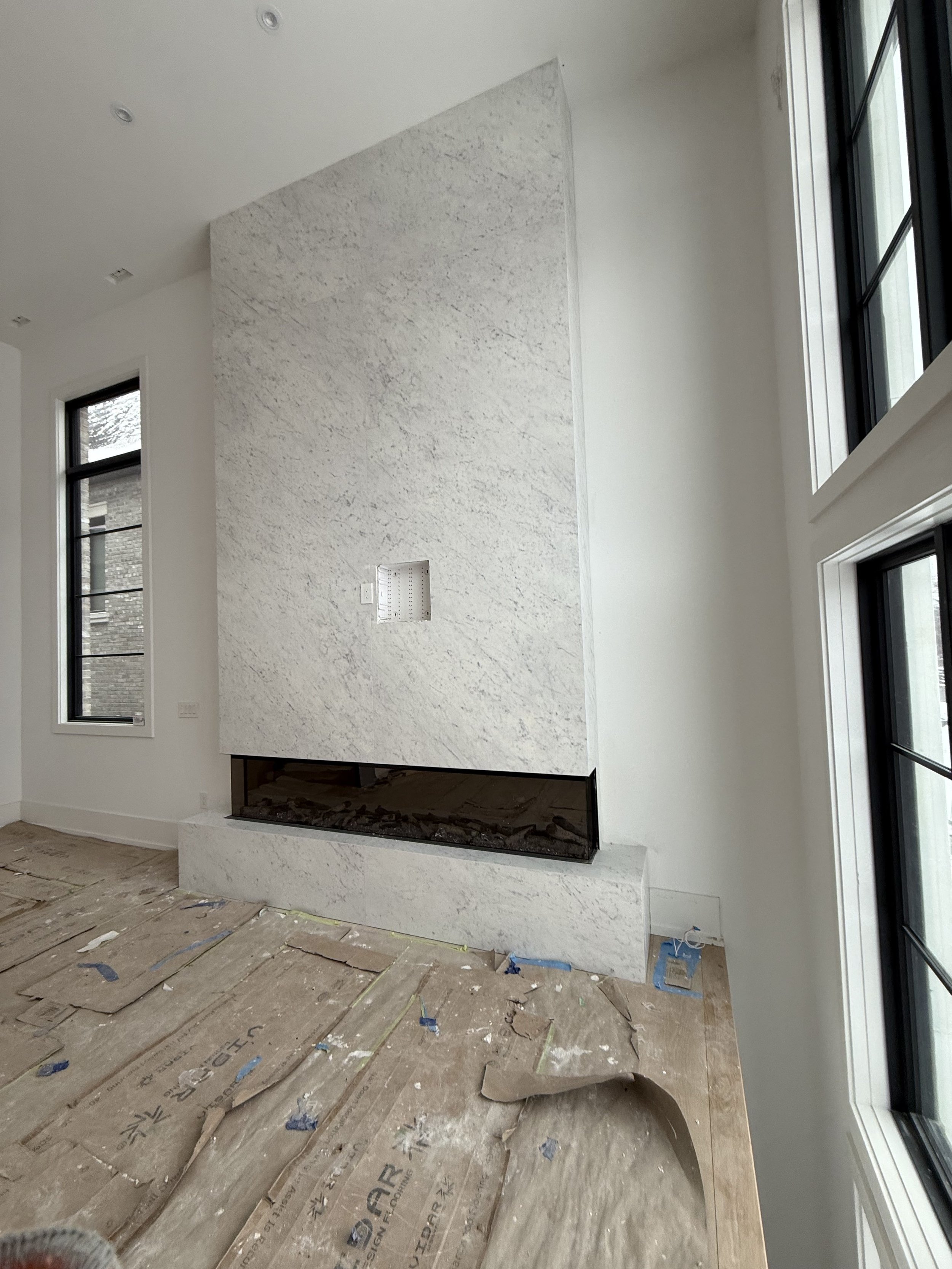White and grey fireplace tiles