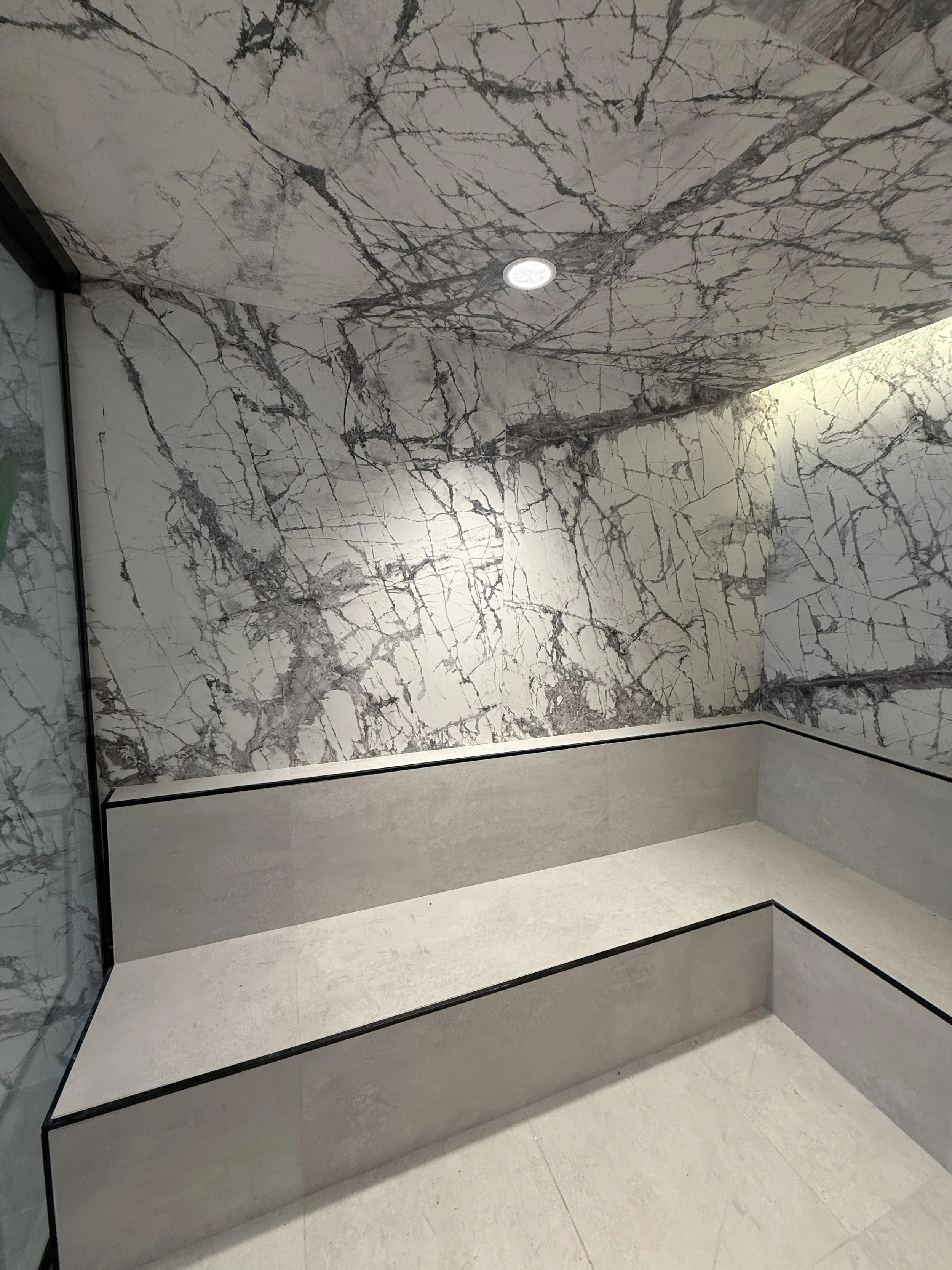 Condo sauna tile installation