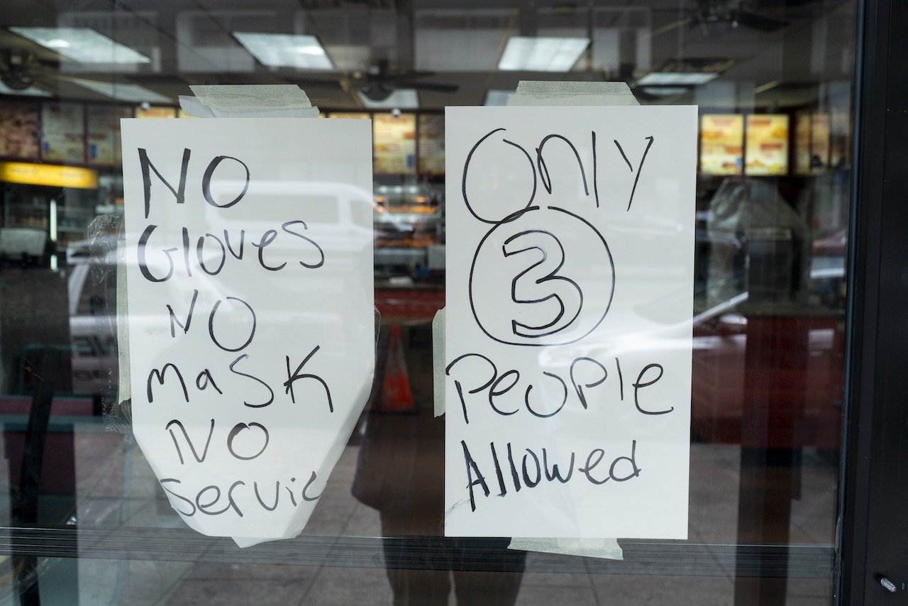 Door sign, Royal Chicken Biscuit, 181 East Market St., Newark, April 16, 2020.