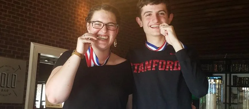 Katelyn & Cole with their medals .jpg